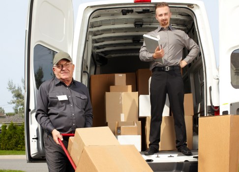Truck loading furniture for a move in Castelnau