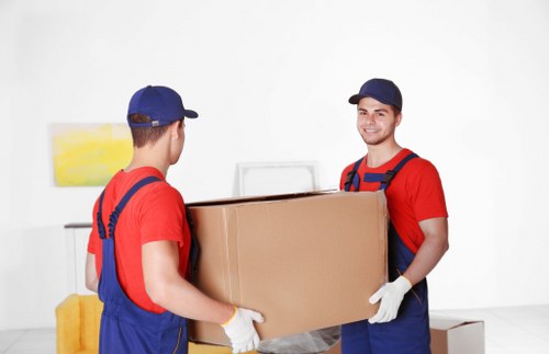 Boxes and office furniture prepared for a local Castelnau commercial move