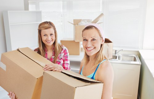 Packed boxes and furniture ready for transport during a local house move
